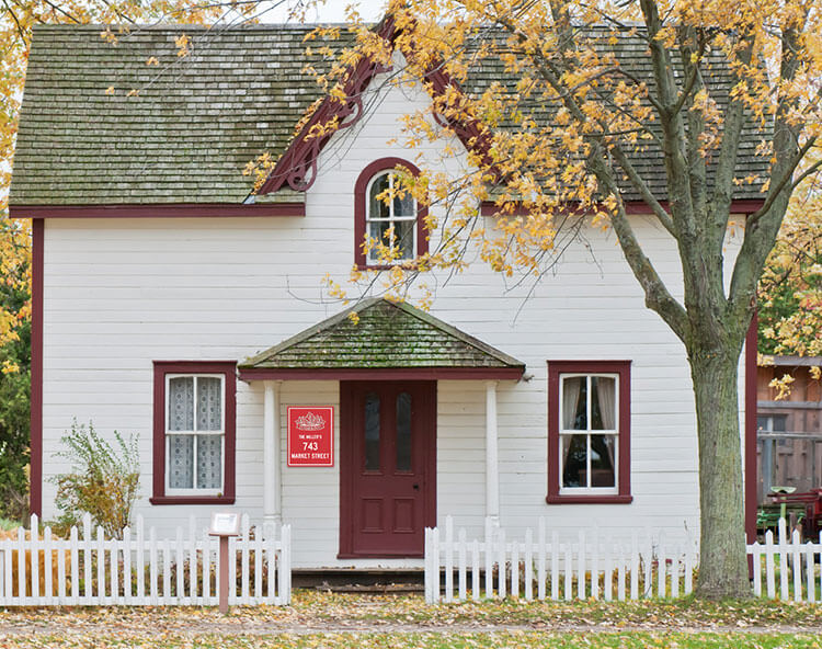 Adorable house with the Strong & Free Plaque